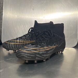 Nike Black and Gold Athletic Shoes with High-Top Design
